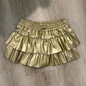 Gold Skirt with shorts underneath. Cute for the upcoming holidays!